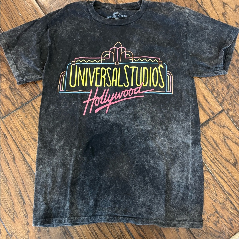 Universal Black Graphic Tee with Subtle Design